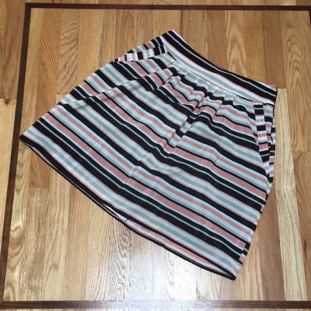Pink and black striped skirt